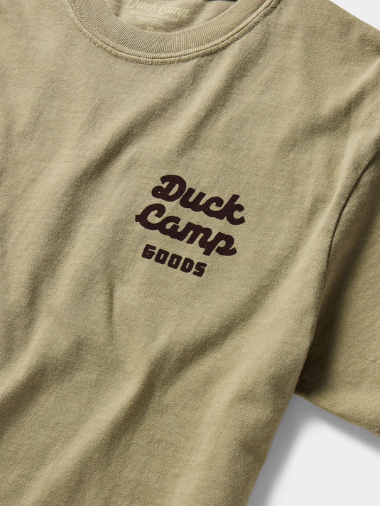 Duck Camp Men's DC Shop Graphic Tee in Vintage Khaki Duck Camp Men's DC Shop Graphic Tee in Vintage Khaki Duck Camp