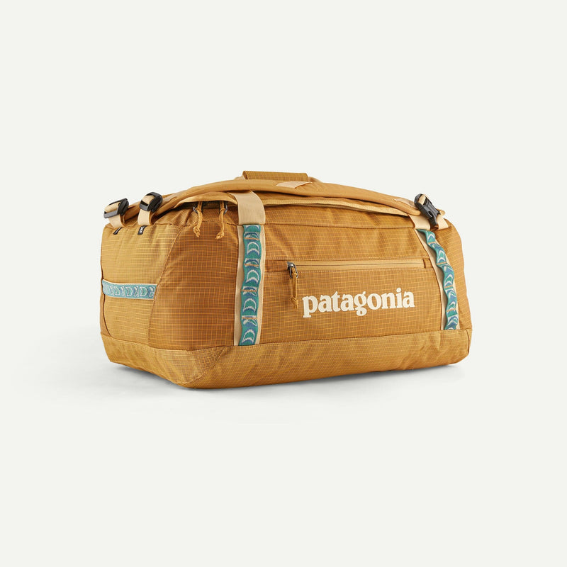 Load image into Gallery viewer, Pufferfish Gold Patagonia Black Hole Duffel 40L Patagonia Black Hole Duffel 40L Patagonia Inc
