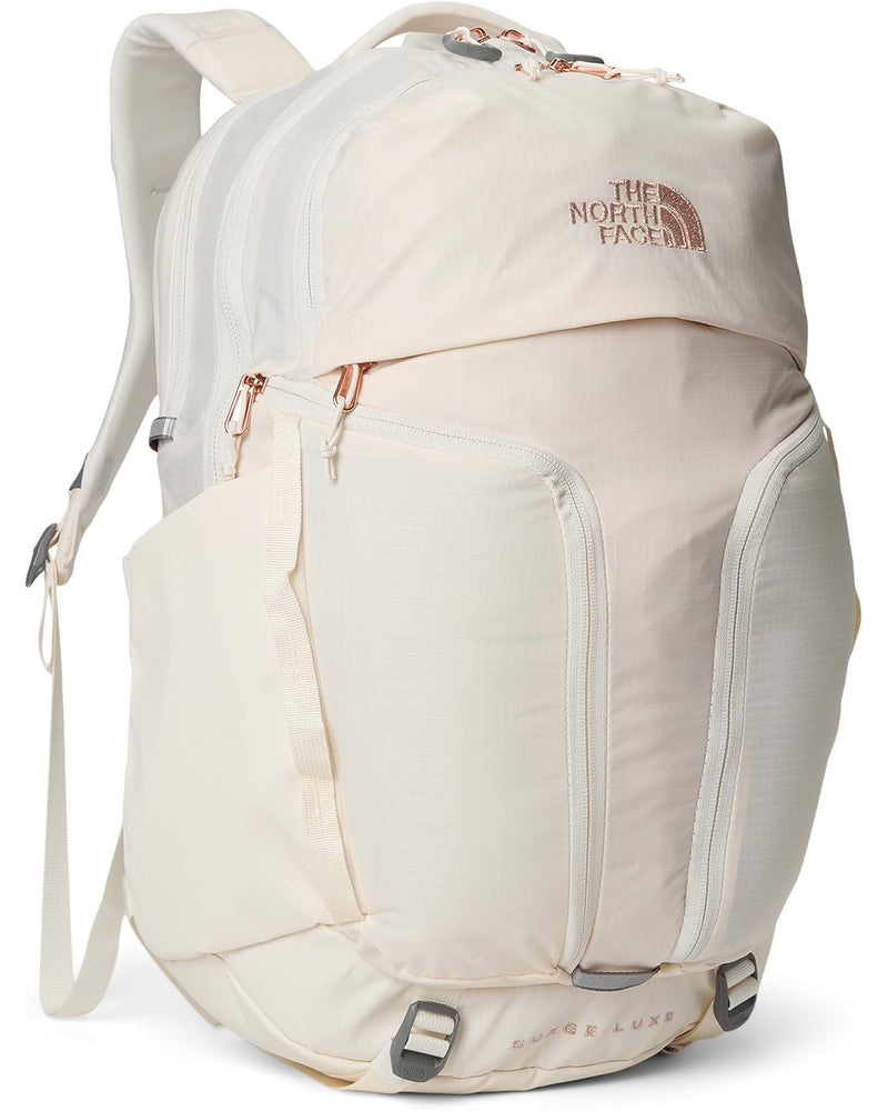 Load image into Gallery viewer, Gardenia White / Burnt Charcoal Metallic The North Face Women&#39;s Surge Luxe in Gardenia White / Burnt Charcoal Metallic The North Face Women&#39;s Surge Luxe in Gardenia White / Burnt Charcoal Metallic The North Face
