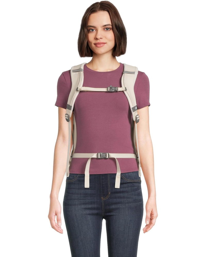 Load image into Gallery viewer, Gardenia White / Burnt Charcoal Metallic The North Face Women&#39;s Surge Luxe in Gardenia White / Burnt Charcoal Metallic The North Face Women&#39;s Surge Luxe in Gardenia White / Burnt Charcoal Metallic The North Face
