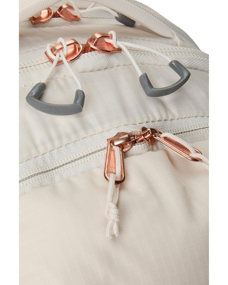 Load image into Gallery viewer, Gardenia White / Burnt Charcoal Metallic The North Face Women&#39;s Surge Luxe in Gardenia White / Burnt Charcoal Metallic The North Face Women&#39;s Surge Luxe in Gardenia White / Burnt Charcoal Metallic The North Face
