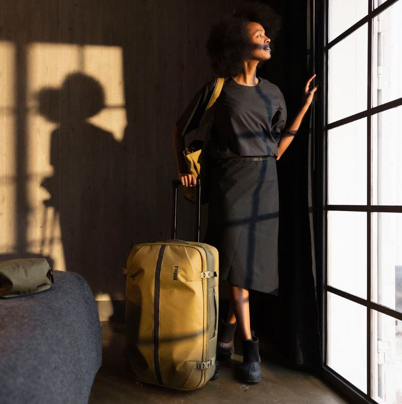Load image into Gallery viewer, Nutria Thule Aion Wheeled Duffel 70Cm in Nutria Thule Aion Wheeled Duffel 70Cm in Nutria Thule
